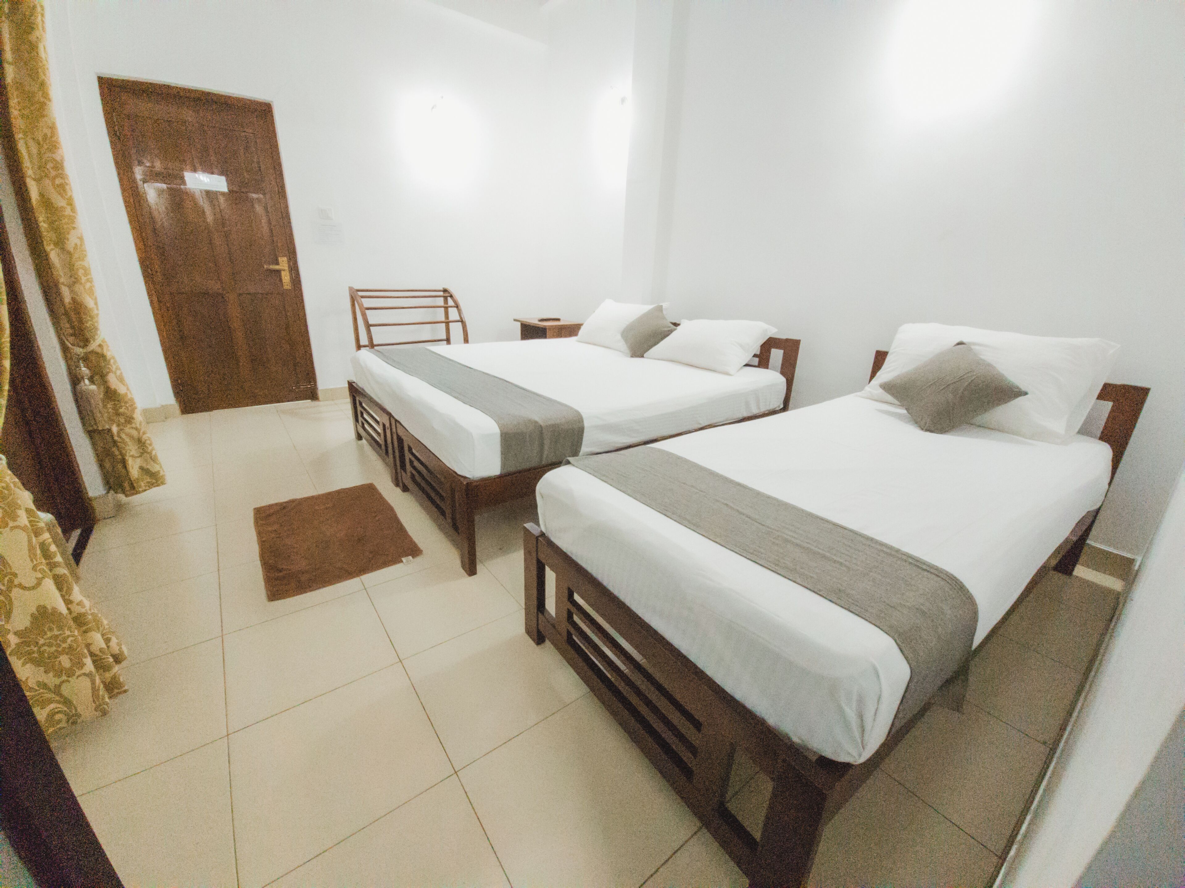 Kamar Triple Mewah, balkon, pemandangan kebun | Ruang kerja ramah laptop dan Wi-Fi gratis
