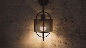A wall-mounted light fixture with a cylindrical shade and a circular base. - New TENUTA MARELLA Farmstay, nestled in the countryside just outside Rome (Lazio)