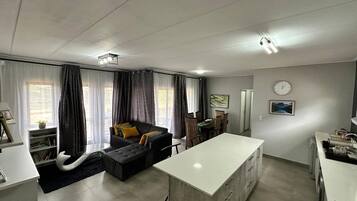 Apartment, 3 Bedrooms | Living room | Books