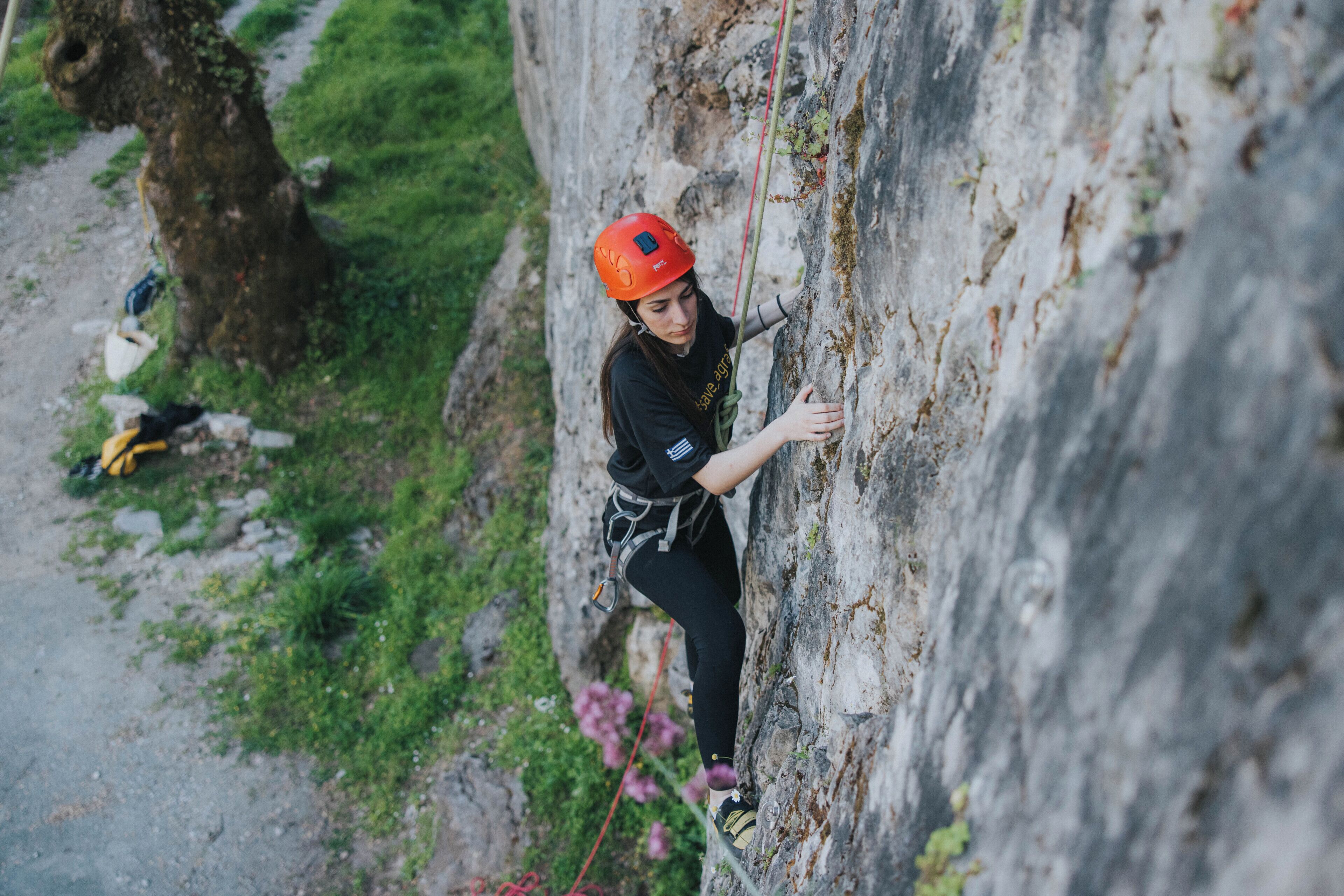 A person climbing a rock face.