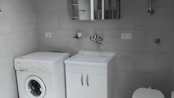Shower, bidet, towels, soap