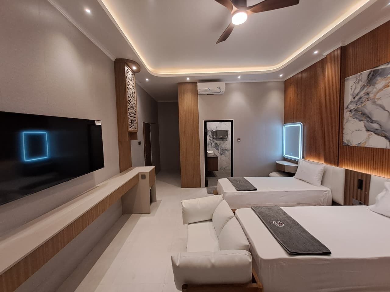 Deluxe Room, Balcony, Pool View | In-room safe, desk, laptop workspace, blackout drapes