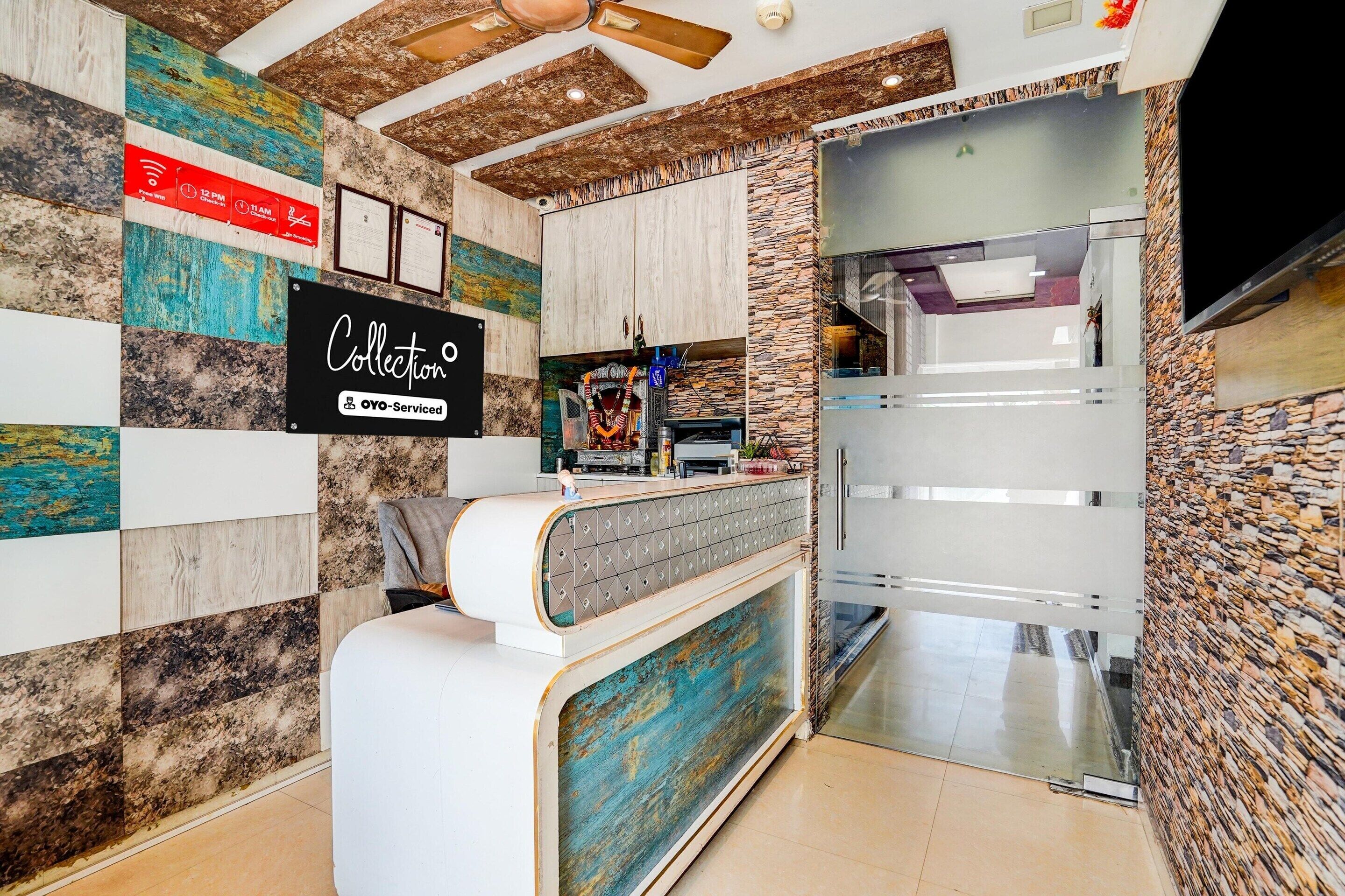 A reception area with a counter, a sign indicating free Wi-Fi, and a collection point.
