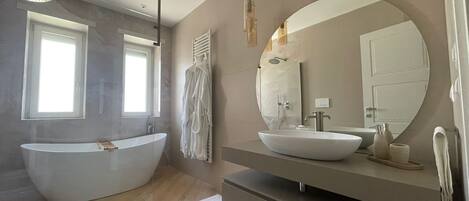 Hair dryer, bidet, towels, soap