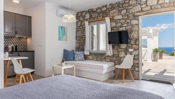 Apartment, Patio, City View | In-room safe, soundproofing, iron/ironing board, free WiFi