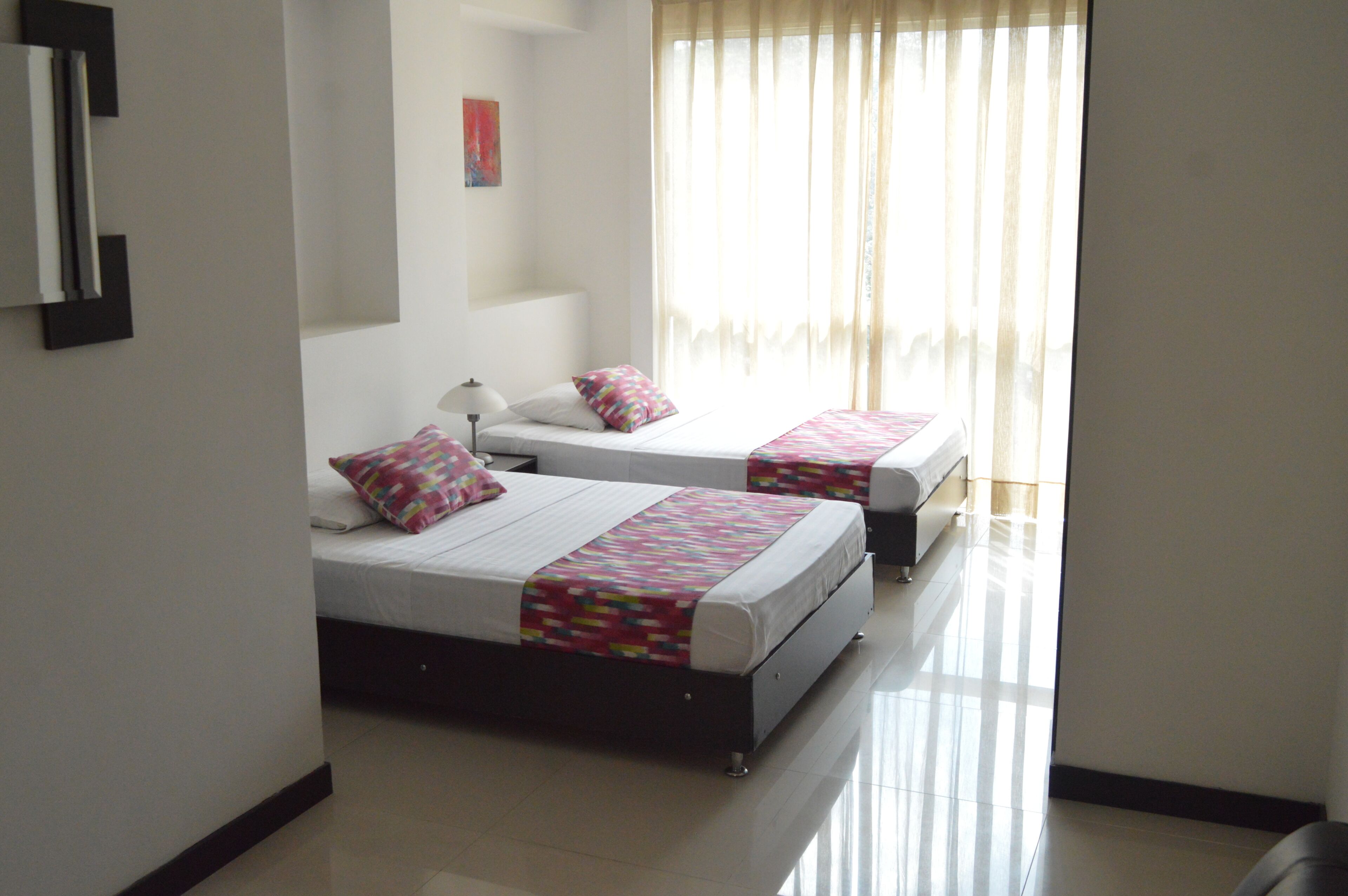 Standard Twin Room | Pillowtop beds, blackout drapes, free WiFi, bed sheets
