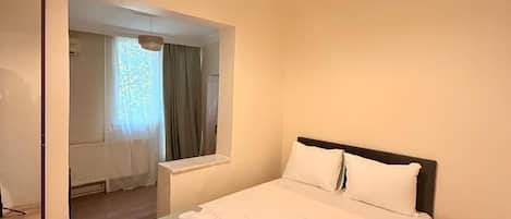 Chambre Familiale | Literie de qualité supérieure, Wi-Fi gratuit, draps fournis