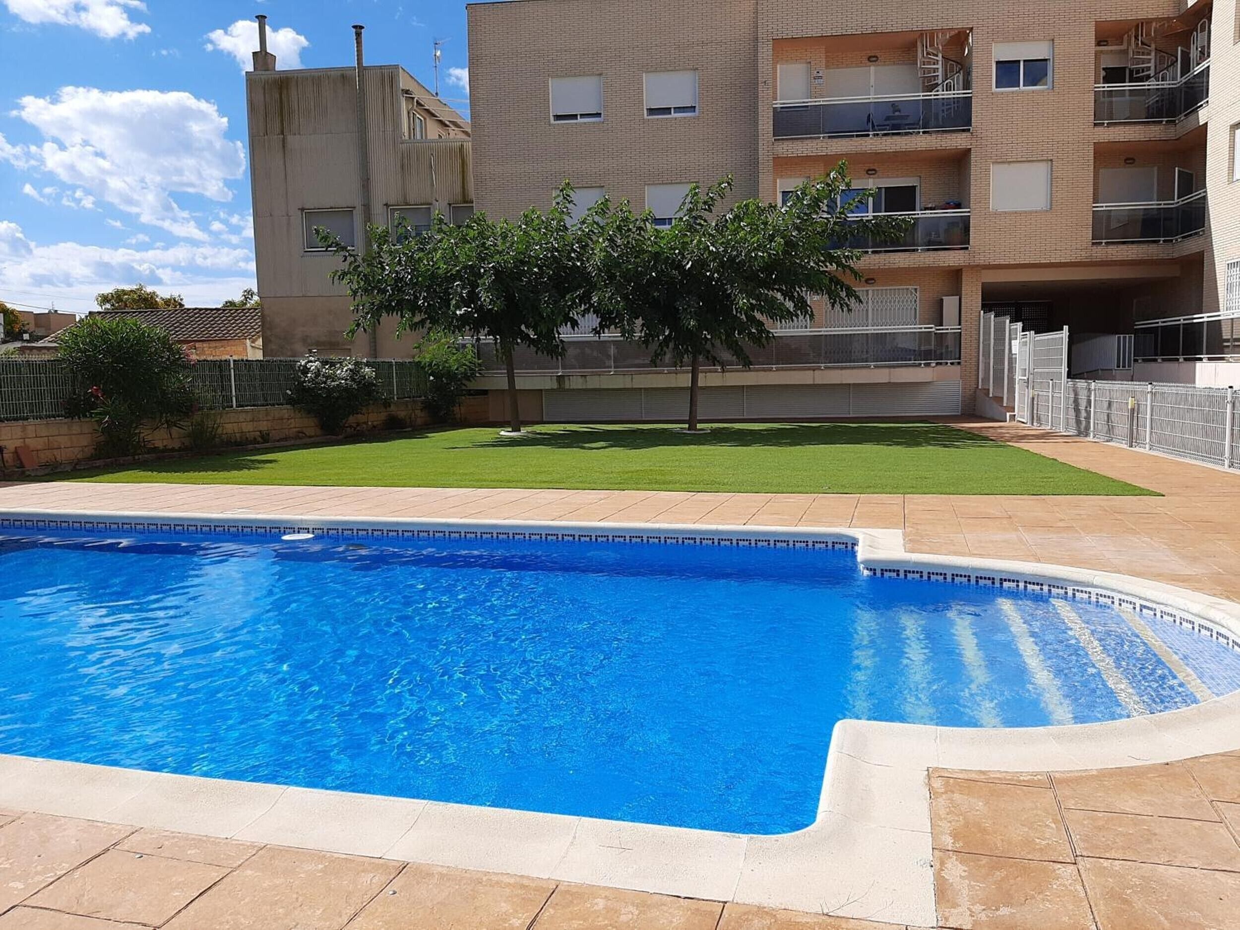 Pool. Ground-Floor Apartment 'Planta Baja Marita' with Shared Pool, Wi-Fi, and Air Conditioning