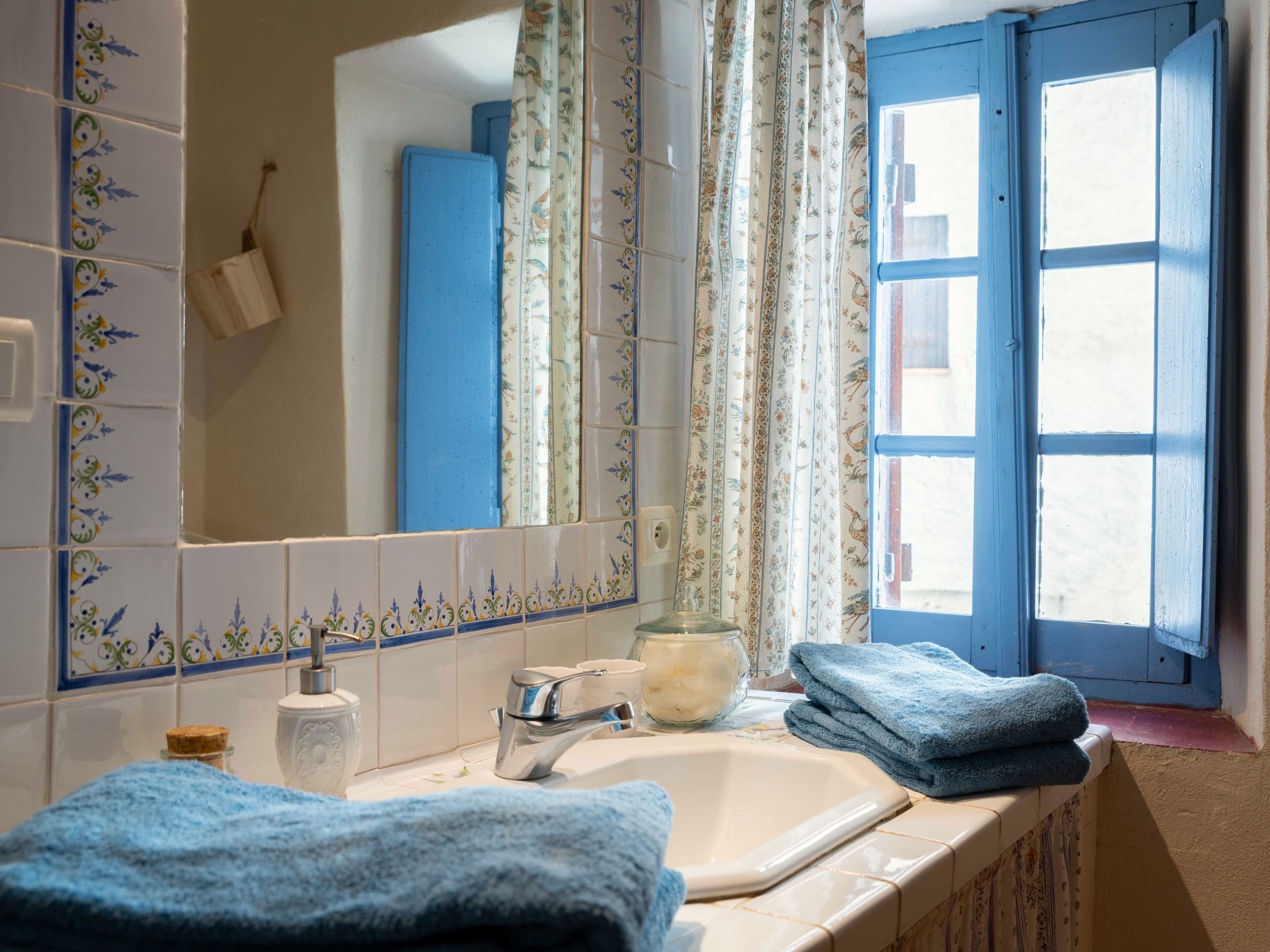 Shower, hair dryer, towels, toilet paper