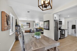 A spacious kitchen with white cabinets, a built-in oven, and a microwave. - Historic Placerville 3BR Sleeps 6 AppleHill (Placerville)