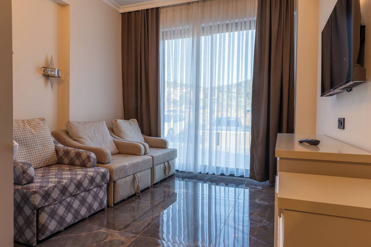 Suite familiar, 2 habitaciones, vista a la montaña | Sábanas de algodón egipcio y ropa de cama de alta calidad 