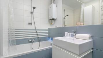 Hair dryer, towels, shampoo