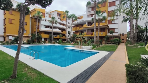 Apartment in La Recoleta Punta Prima, Communal pools and steps away from the sea