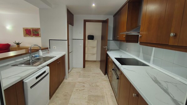Private kitchen - Apartment in La Recoleta Punta Prima, Communal pools and steps away from the sea (Punta Prima)