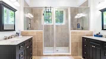 Shower, hair dryer, towels, shampoo