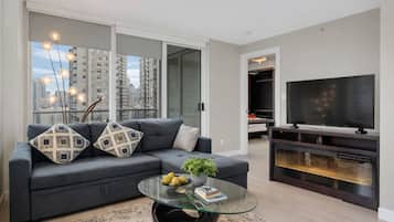 Apartamento luxo, vista para a cidade | Área de estar