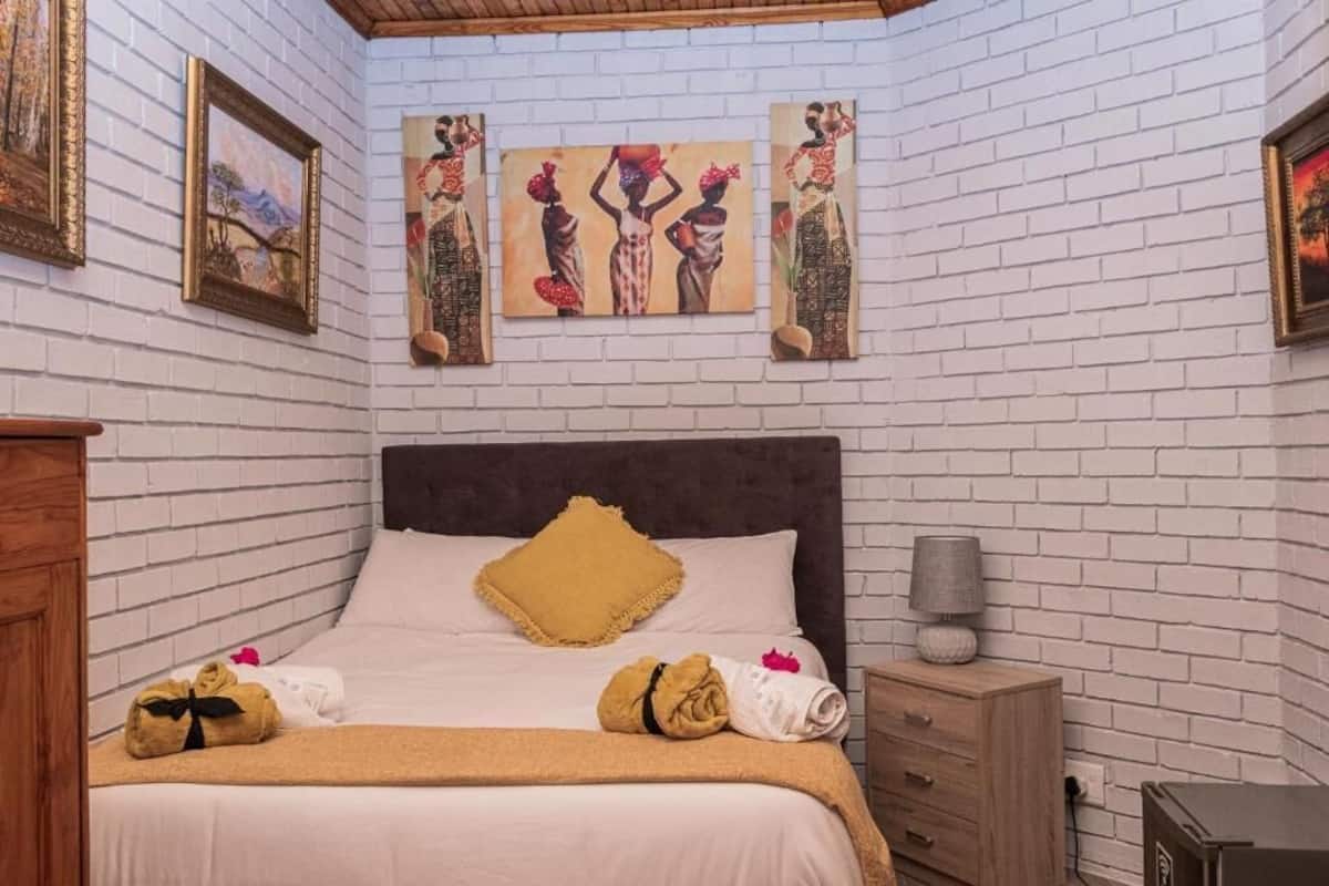 Quarto clássico, vista para o jardim | Quartos à prova de som, ferros/tábuas de passar roupa, Wi-Fi de cortesia