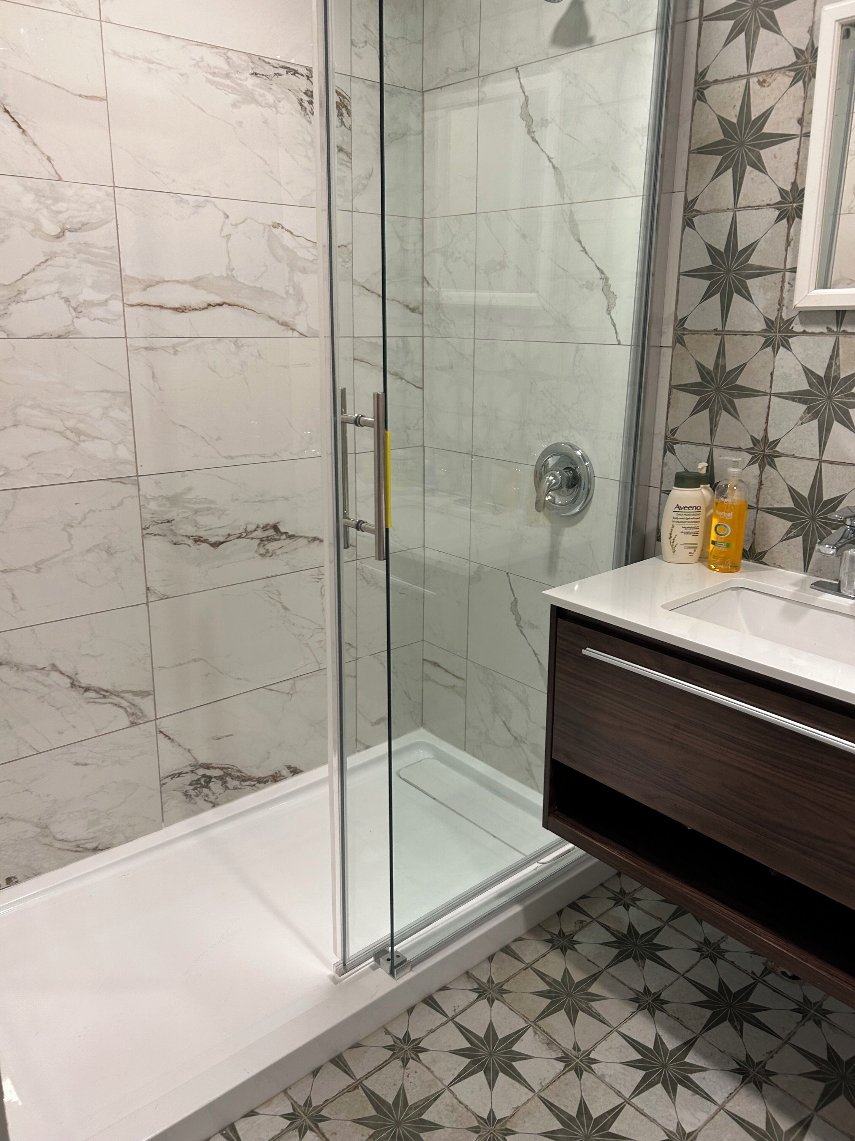 Shower, towels, soap, toilet paper