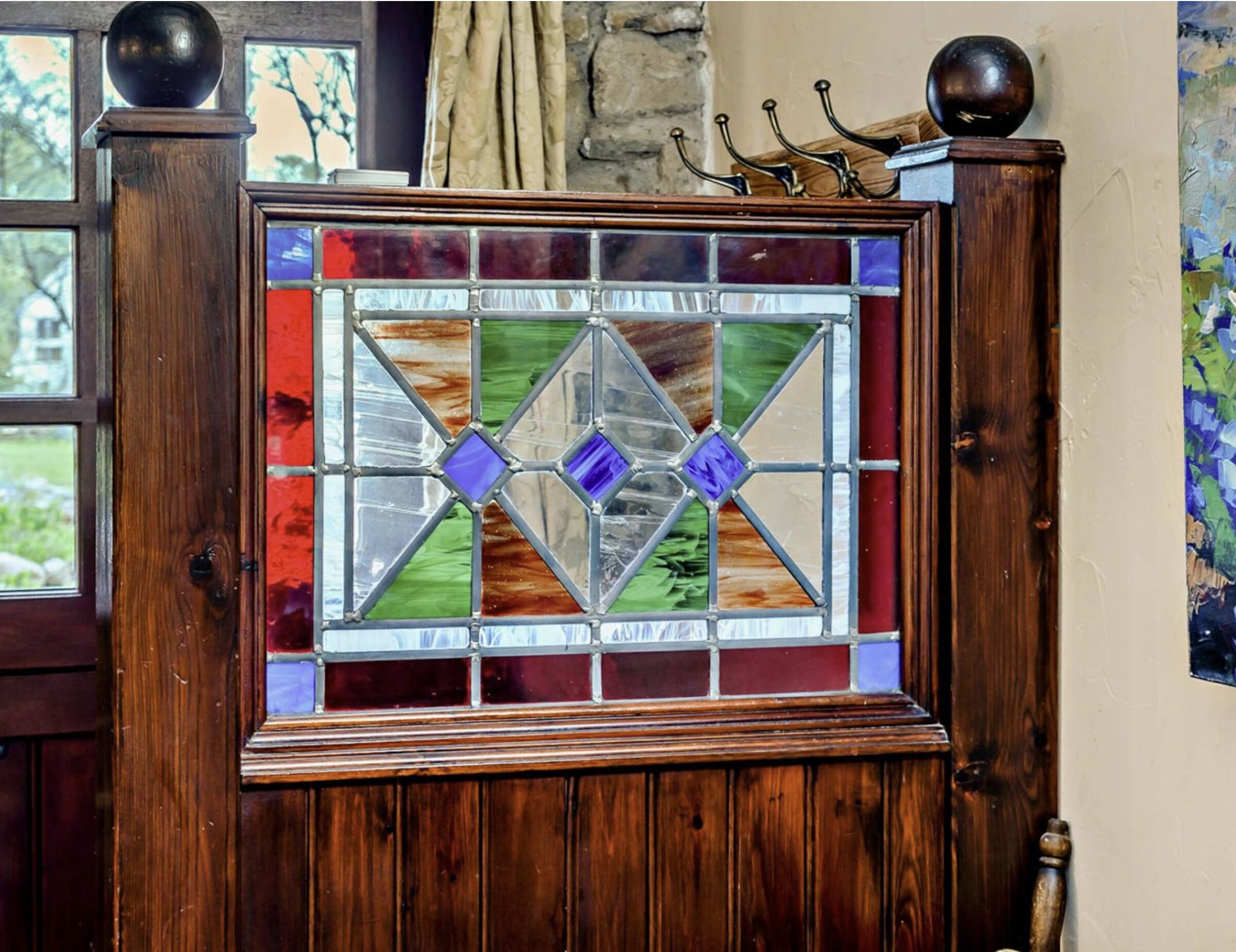 Stable entrance stained glass