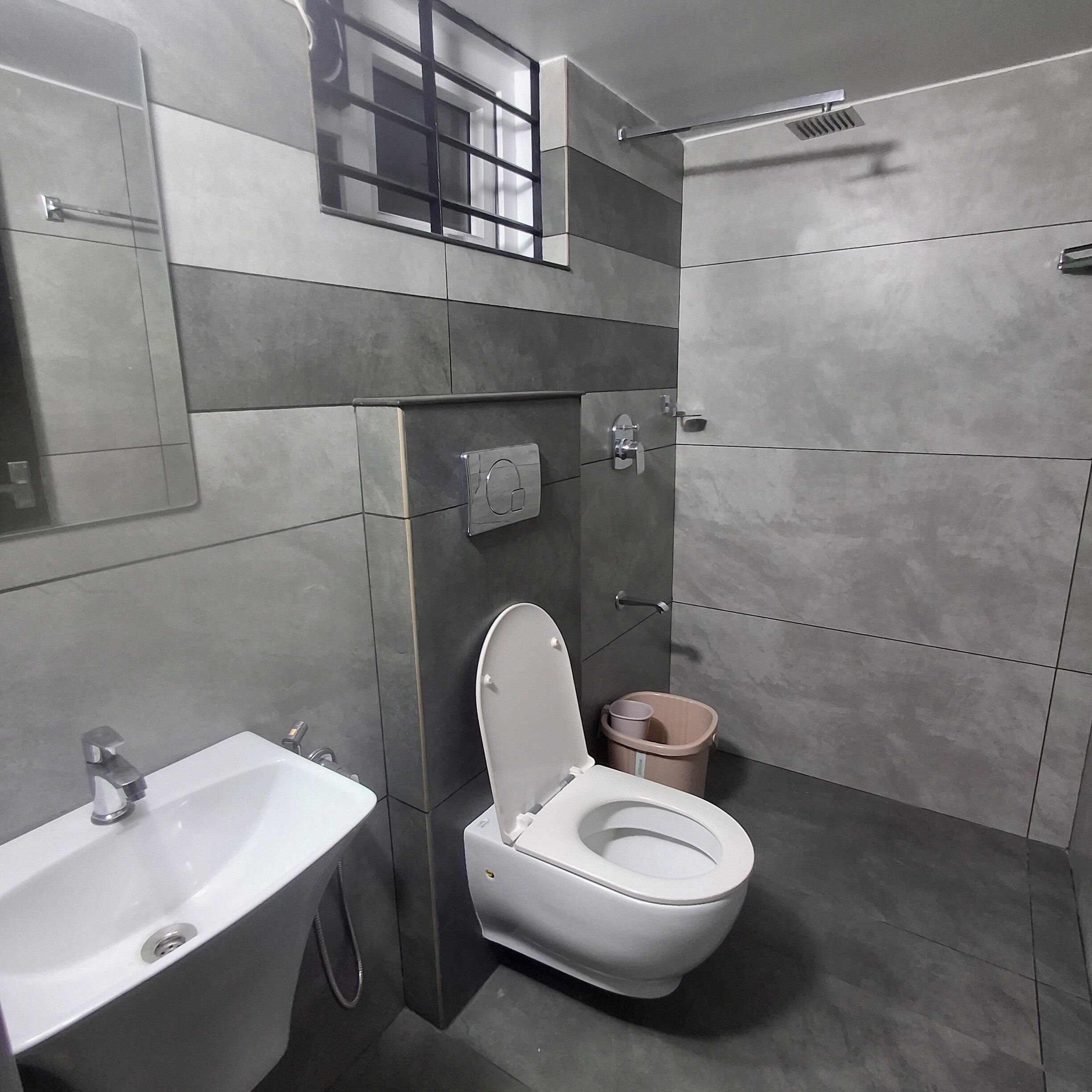 Shower, towels, soap, toilet paper