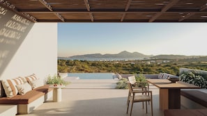 A rooftop terrace with a pool, seating area, and a view of the landscape. - ONERO (Milos)