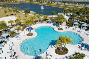 A heated pool - Solara Resort 5BR Home with FlowRider Access (Kissimmee)
