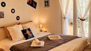 Suite Olive ( 2e chambre disponible à partir de 3 personnes - PMR) | Phòng cách âm, bàn ủi/dụng cụ ủi quần áo