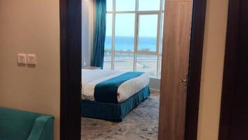 Basic Apartment, Partial Sea View | In-room safe, blackout drapes, iron/ironing board, free WiFi