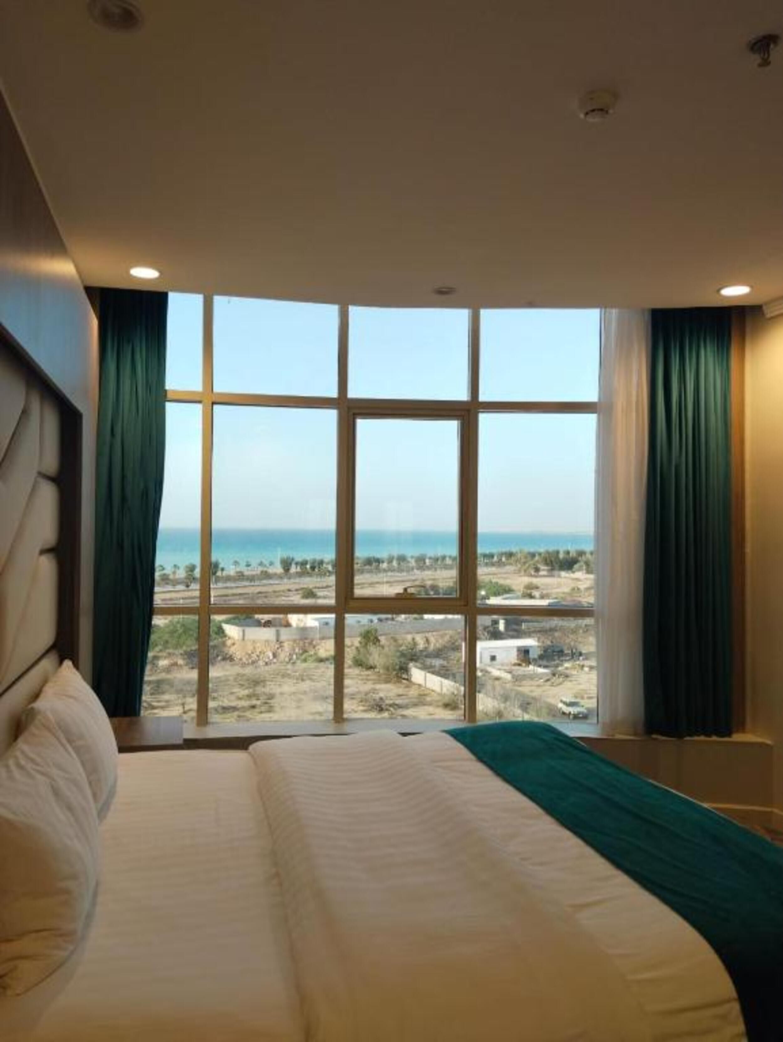 Basic Apartment, Partial Sea View | In-room safe, blackout drapes, iron/ironing board, free WiFi