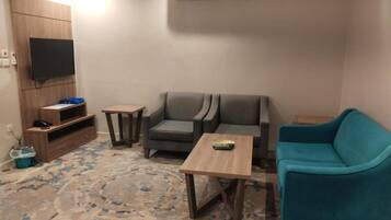 Basic Apartment, Partial Sea View | Living area