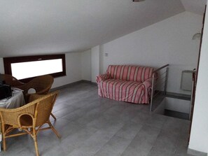 Living area - Attic room near the beach (Alghero)