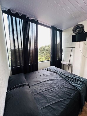 Room - Comfortable studio apartment in Serra Cantareira. (Caieiras)
