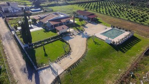 An aerial view of a residential property with a swimming pool, a tennis court, and a large house with multiple rooms. - Villa Aurelia | Private Pool, 10 Guests, Near the Sea (Sicilia)