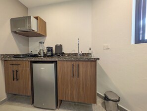 Estudio Confort, 2 camas Queen size | Cocina privada | Frigobar, microondas, parrilla de estufa y utensilios de cocina 