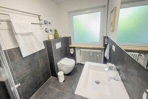 Shower, soap, shampoo, toilet paper