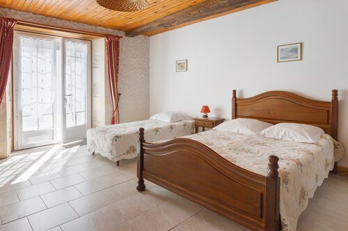 Chambre d’hôtes « Les Lilas » avec terrasse partagée, jardin commun et Wi-Fi