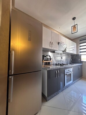 Private kitchen - Delightful 2-bedroom apartment with AC in vibrant Marrakesh (Marrakesh)