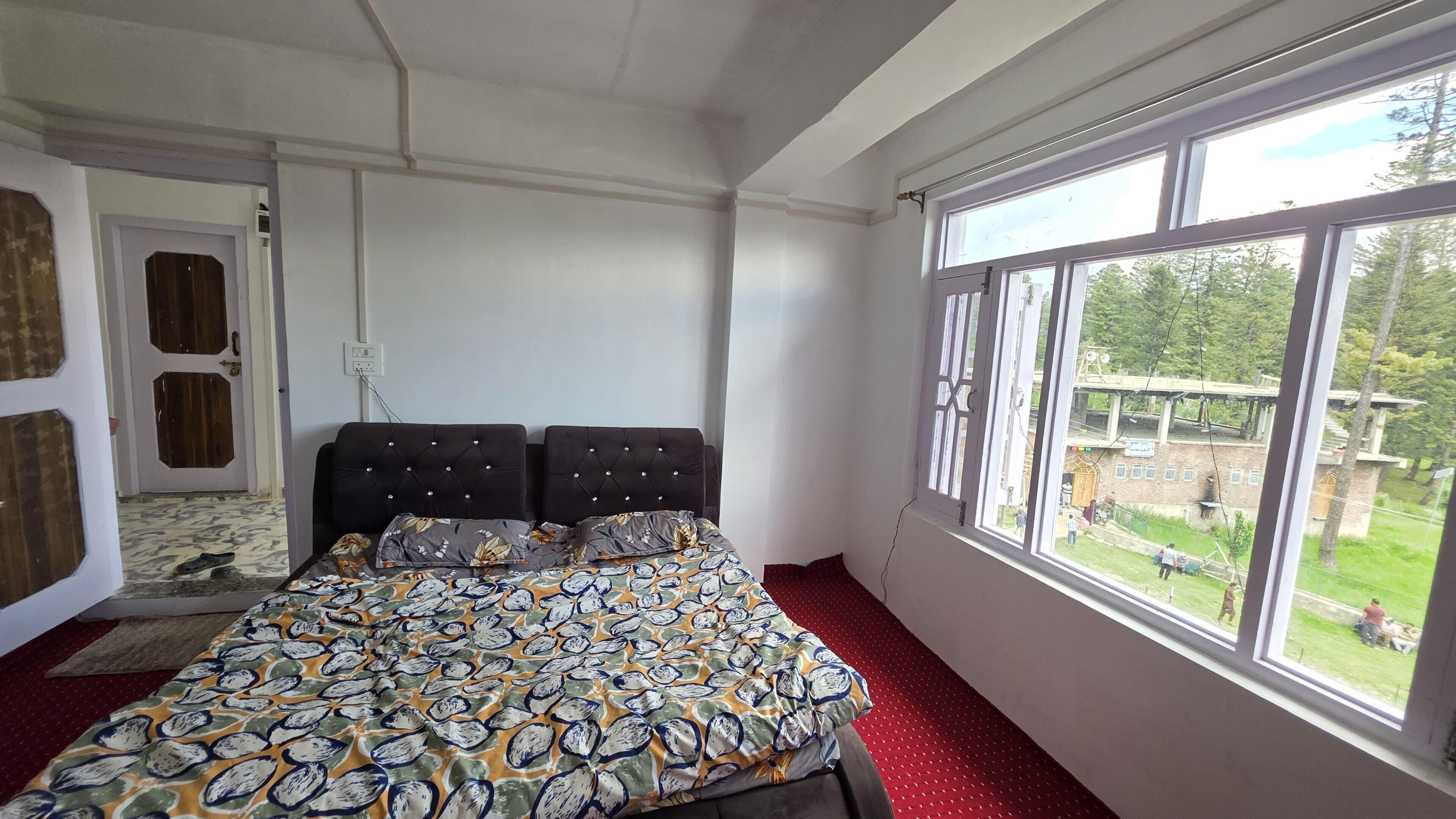 Habitación doble Deluxe, balcón, vista a la montaña | Interior