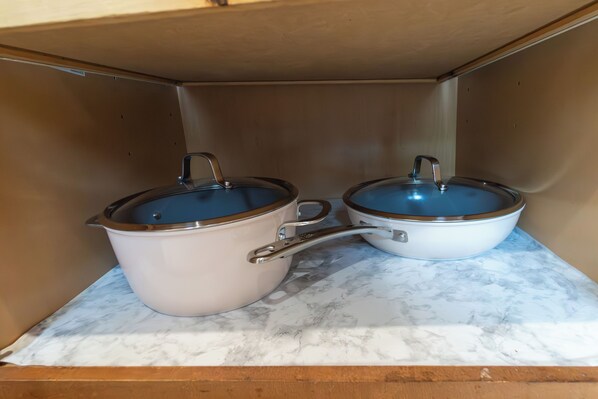 A kitchen with two pots on a marble countertop. - Spacious Home, 10 min to Boston, Sleeps 12, Free parking 3 cars, Outdoor area (Chelsea)
