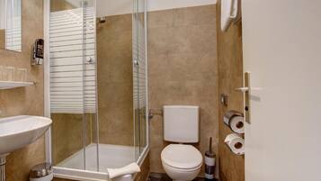 Family Room, Multiple Beds | Bathroom | Shower, hair dryer, towels, soap