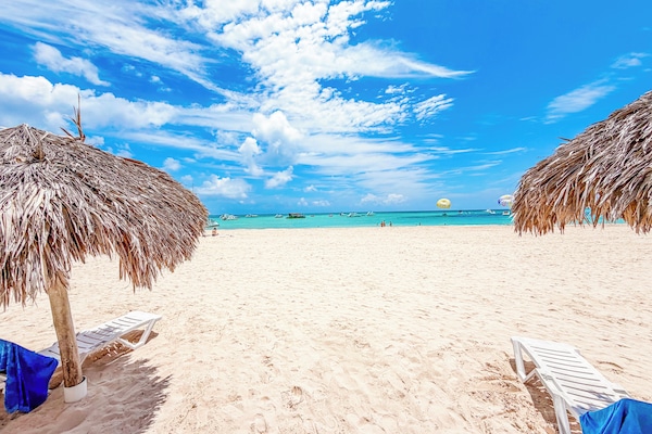 On the beach, white sand, 3 beach bars