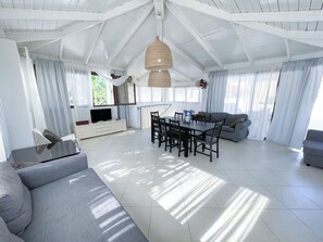 Comfort Villa, 2 Bedrooms, Garden View | Living area | LCD TV - Caribbean Los Corales Villas Suite SPA (Punta Cana)