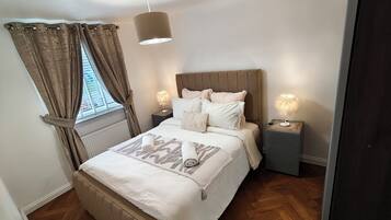 2 bedrooms, iron/ironing board, WiFi, bed sheets