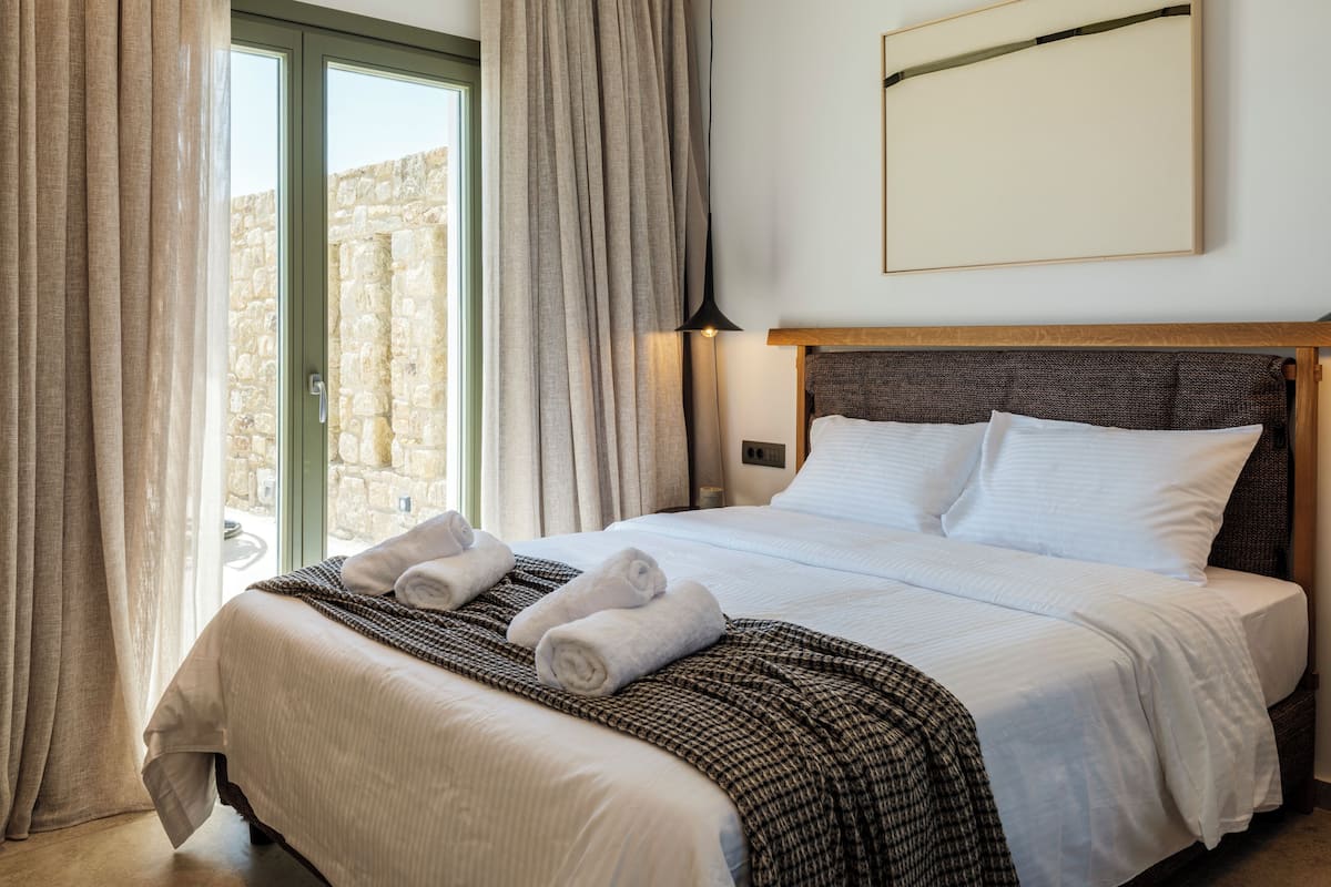 Villa, vista al océano | Ropa de cama de alta calidad y cortinas blackout