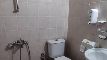 Family Room, Balcony, Garden View | Bathroom | Shower, hair dryer, towels, soap