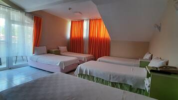 Family Room, Balcony, City View | Free WiFi