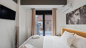 Deluxe Double Room, City View | Premium bedding, desk, laptop workspace, cribs/infant beds