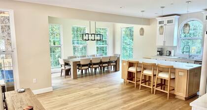 BRAND NEW HOME with amazing roof top, 2 front patios, and rear "forest" patio.