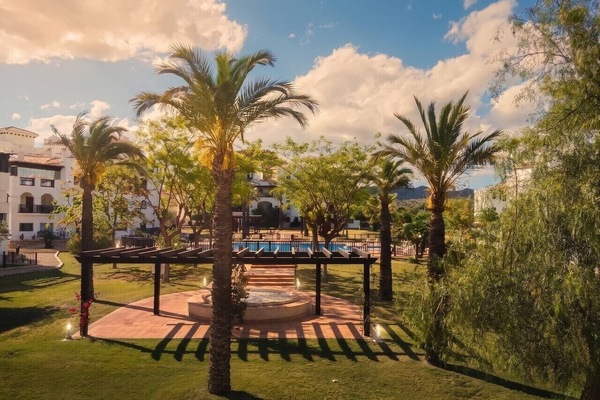 Largest pool in famous El Valle Golf Resort, sun loungers, outdoor showers.