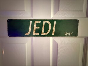 A sign with the word 'JEDI' and 'WAY' on a door. - Star Wars & Wizards Themed XL Pool Home Near Disney (Davenport)